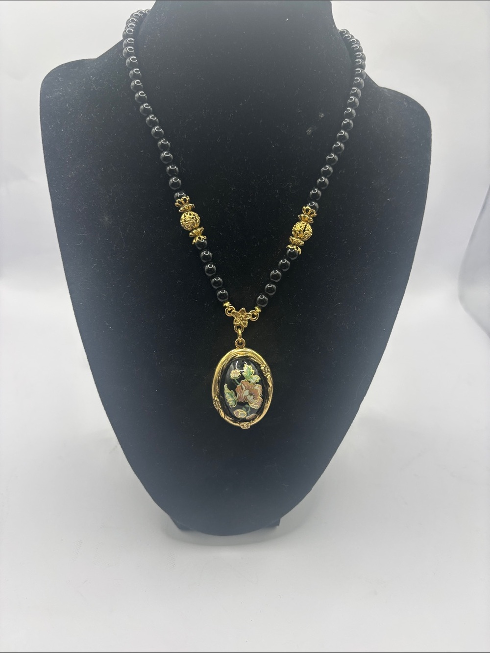 1928 Black Beaded Necklace with Gold Floral Oval Pendant